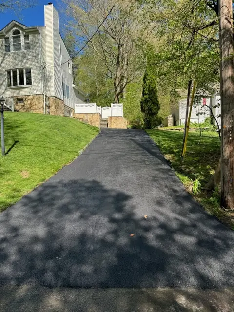 Fresh asphalt, side yard