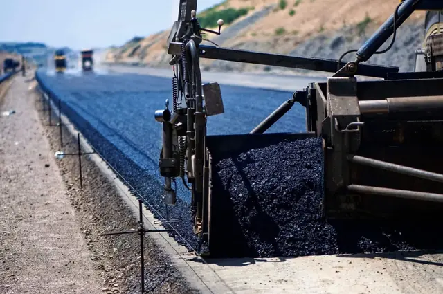 Paving a road